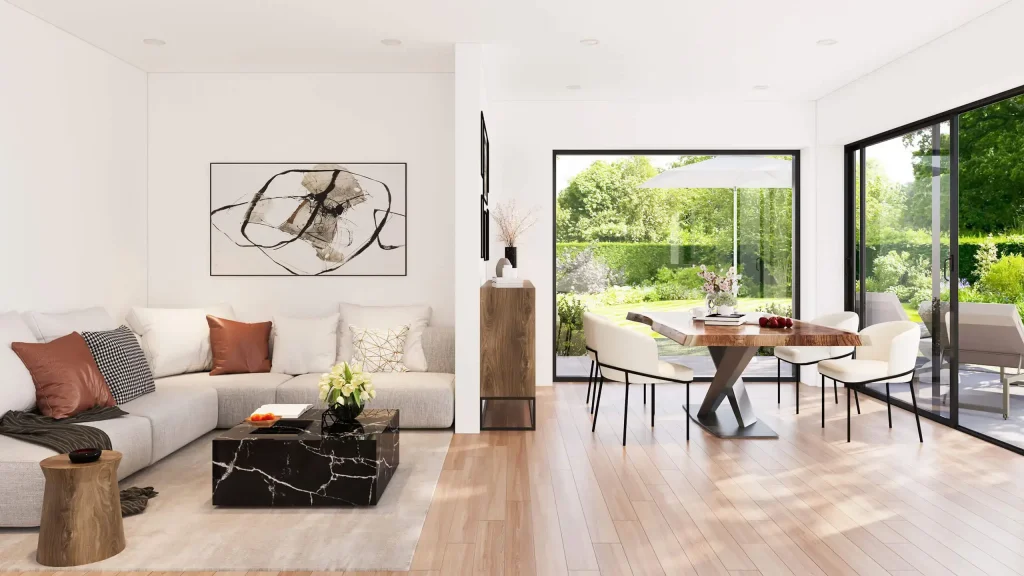 Gesundes Wohnklima und offene Raumkonzepte im Ecoline Holzhaus Heller, moderner Wohn- und Essbereich in einem Ecoline Holzhaus mit sichtbaren Holzbalken.